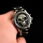 Luxury gothic skull watch with metallic bronze face and black strap