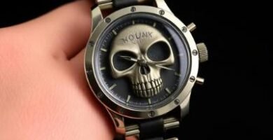 Luxury gothic skull watch with metallic bronze face and black strap