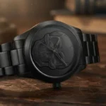 Black stainless steel watch with a skull face design